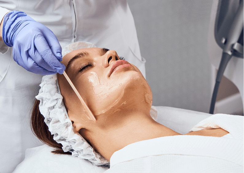 Woman receiving skincare treatment