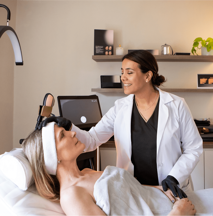 Skincare specialist performing facial therapy